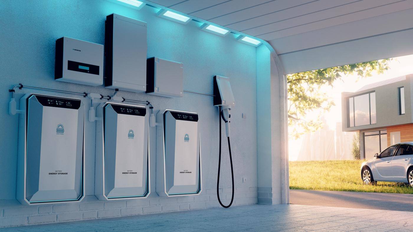 Concept of a home battery energy storage located in a garage with a sunny background with lawn car, family house and big city. 3d rendering.