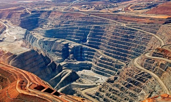 A vast and deep quarry site.