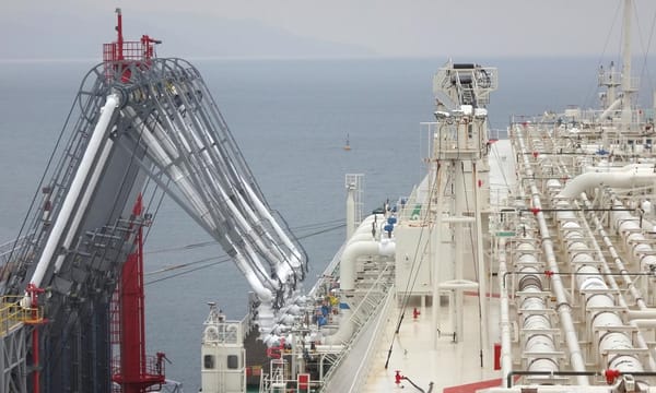 Oil and gas industry - liquefied natural gas tanker LNG under cargo operations.