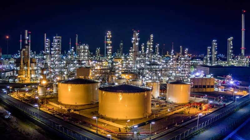 Oil refinery plant from bird eye view at night.