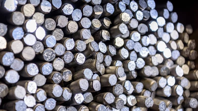 A pile of stack steel rods.