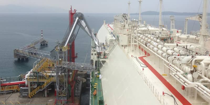 Oil and gas industry - liquefied natural gas tanker LNG under cargo operations.