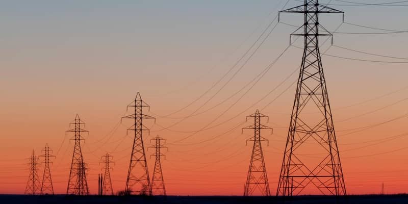 Electricity pylons at sunset.