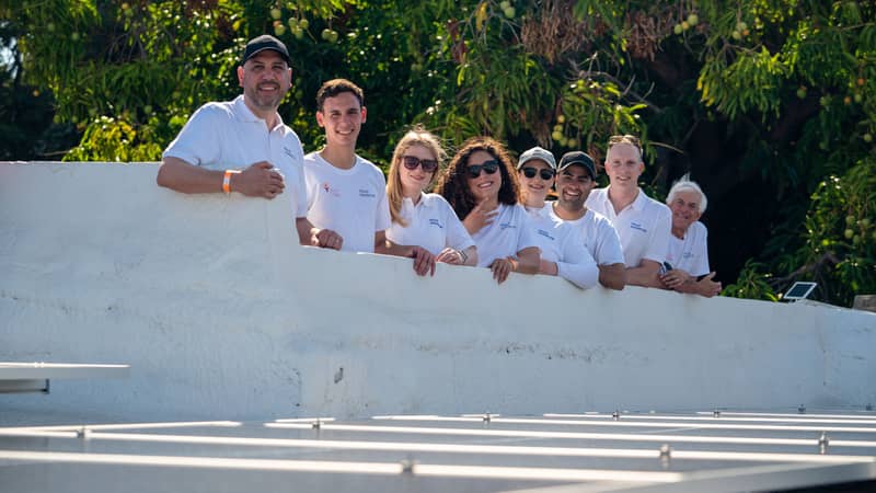 Image shows Wood Mackenzie's team of volunteers in Adjuntas
