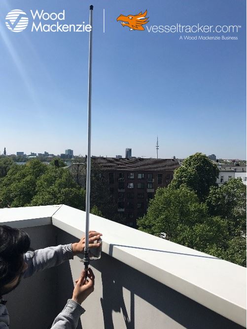 Figure 1: Genscape Vesseltracker antenna team member installing a new antenna.