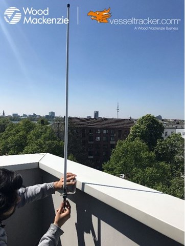 Figure 1: Genscape Vesseltracker antenna team member installing a new antenna.