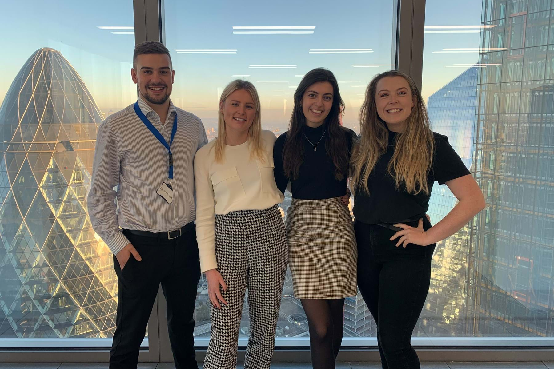 Image shows sales apprentices Millie, Anna, Harry and Emily in our Bishopsgate, London office