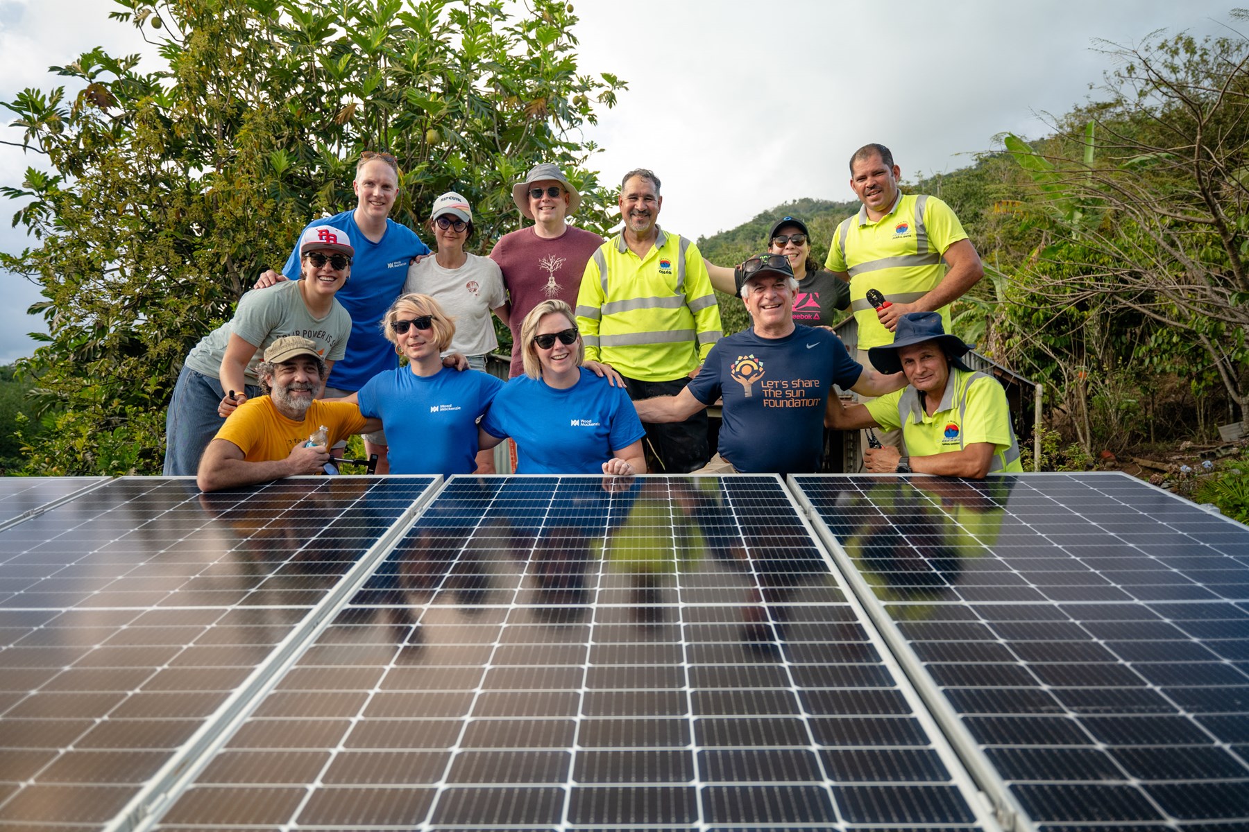 Pictured: Wood Mackenzie volunteers in central Puerto Rico through a partnership with Let’s Share the Sun