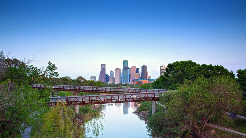 Urban Buffalo Bayou Park offers downtown Houston a green oasis for recreation.  The Rosemont Pedestrian Bridges give pedestrians, bicyclists and joggers safe access across the Buffalo Bayou River and also beautiful views of the skyline.