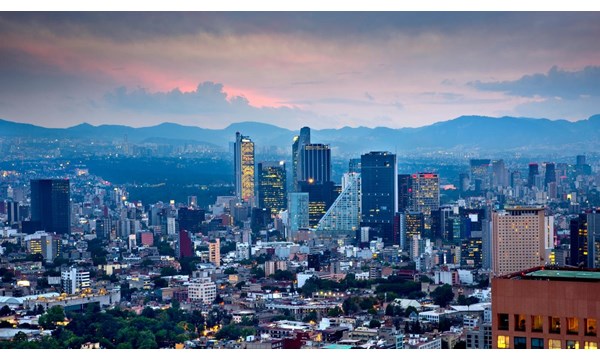 Elevated view of the modern office buildings along Paseo de la Reforma in Mexico City.  The lower buildings to the right are located in the district of Polanco.