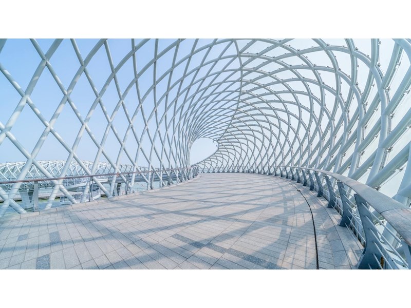 Modern geometrically covered bridge, shot in Suzhou city, China.