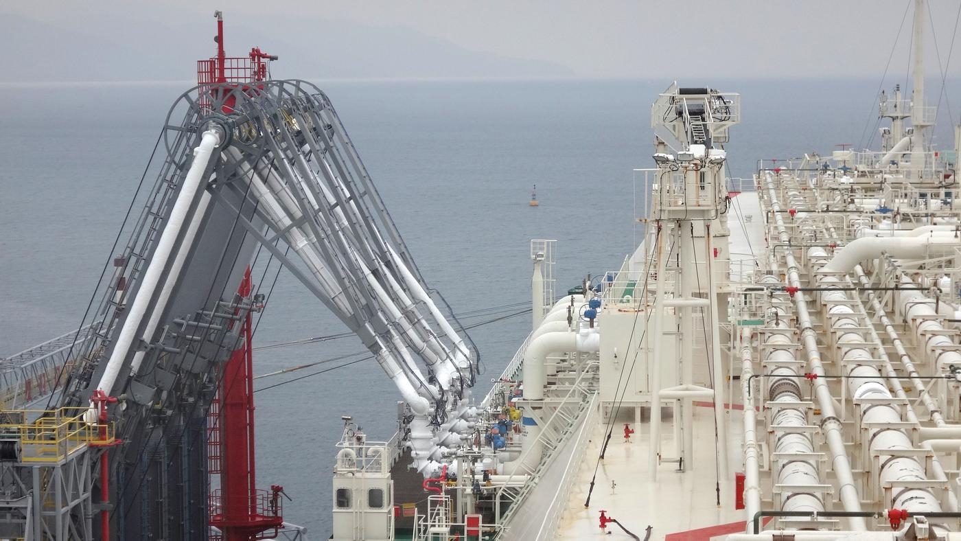 Oil and gas industry - liquefied natural gas tanker LNG under cargo operations.