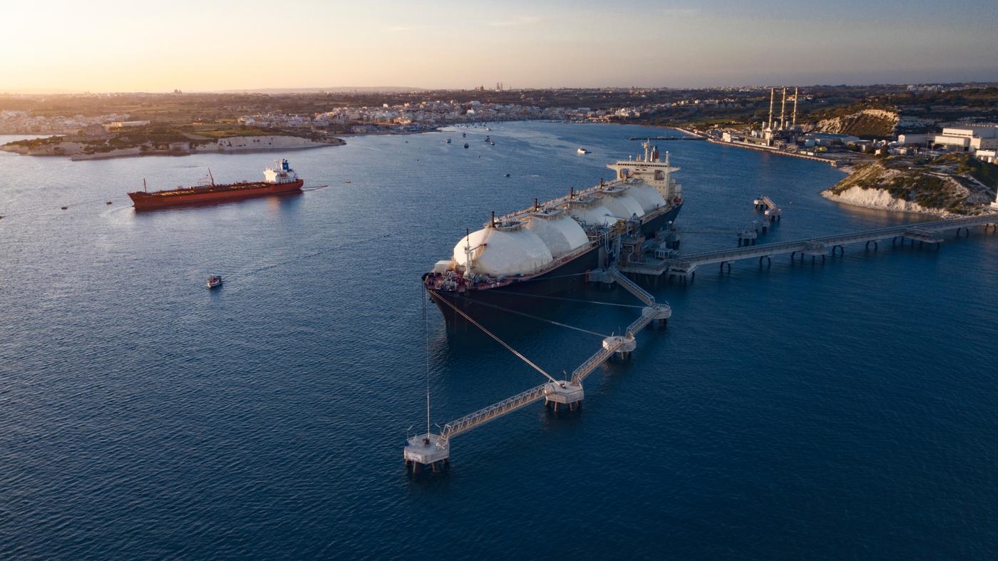A gas carrier moored close to a liquefied natural gas power plant