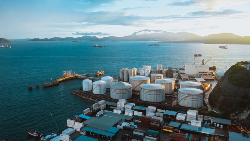 Oil tankers and oil tanks in port at night