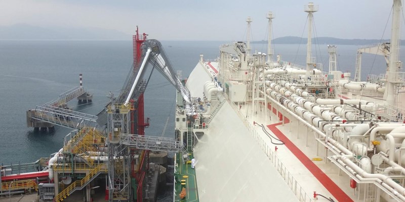 Oil and gas industry - liquefied natural gas tanker LNG under cargo operations.