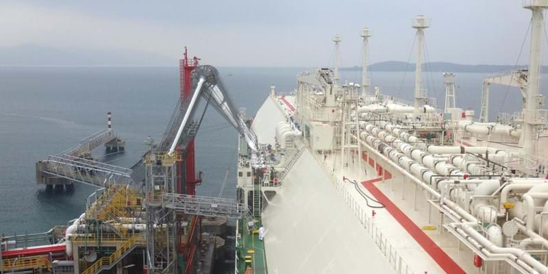 Oil and gas industry - liquefied natural gas tanker LNG under cargo operations.