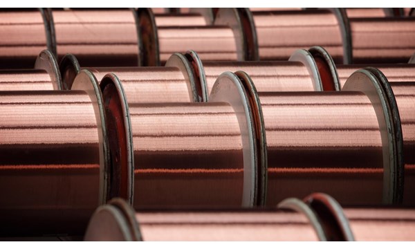 Spools of copper wire in a factory.