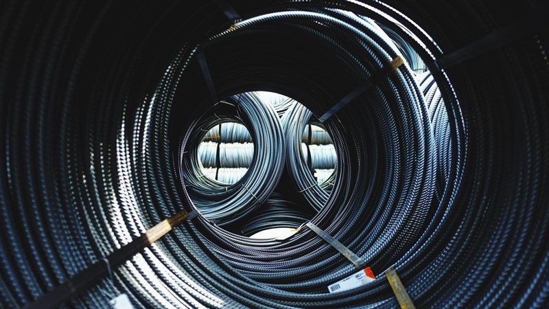 Bound roped steel in a warehouse.