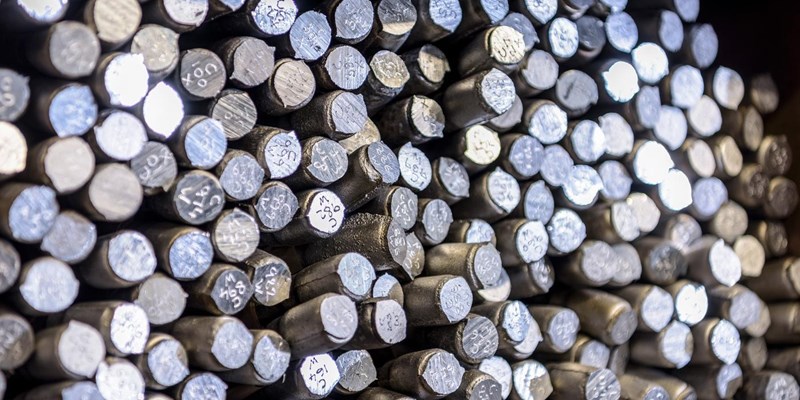 A pile of stack steel rods.