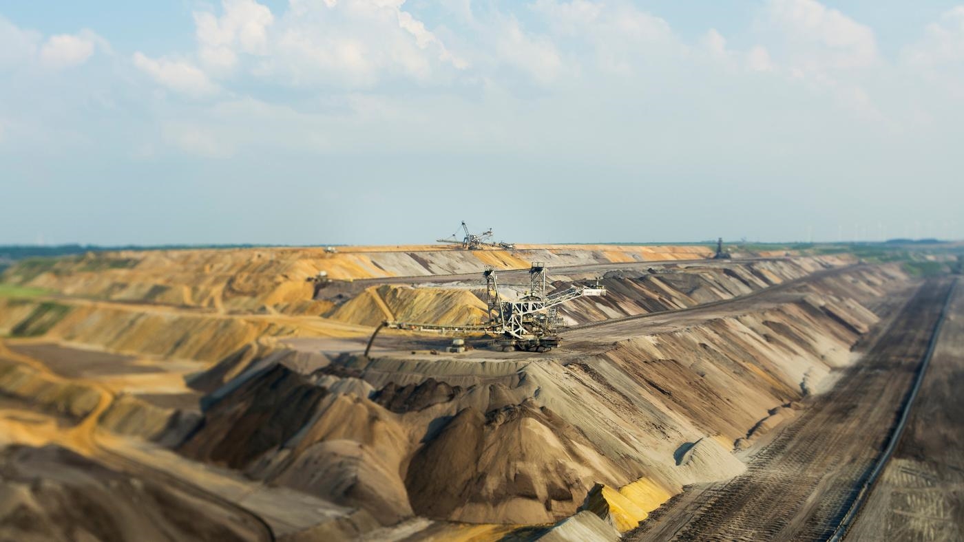 Excavating taking place in a large quarry.