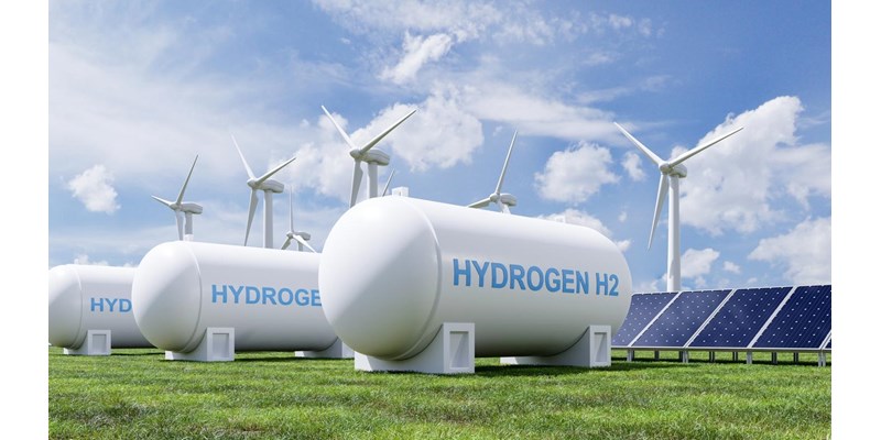 A render of a group of hydrogen tanks, solar panels and wind turbines.