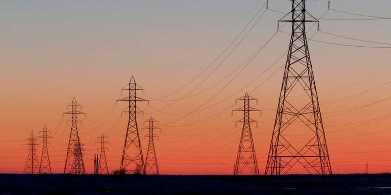Electricity pylons at sunset.