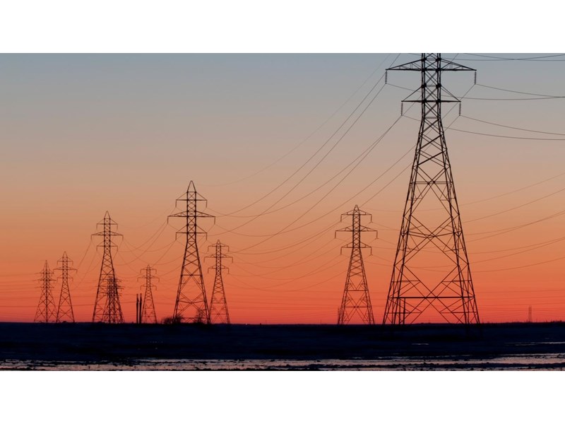 Electricity pylons at sunset.