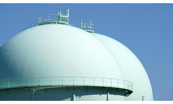 Sphere gas tanks in petrochemical plant against the blue sky.