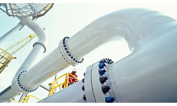 Worker on HP Separator, FPSO offshore, Angola. Floating Production Storage and Offloading units house both processing equipment and storage for produced hydrocarbons.