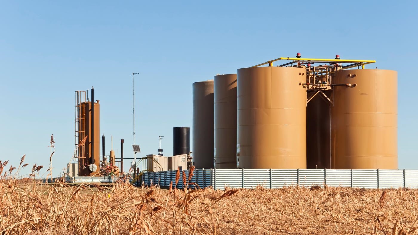 Storage tanks and treater for separating water from crude or condensate from natural gas in central Colorado, USA.