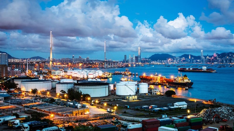 Oil Plant and Gas tank and cable rolls at night moment.
