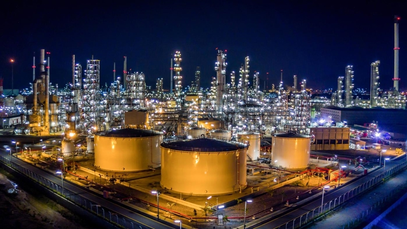 Oil refinery plant from bird eye view at night.