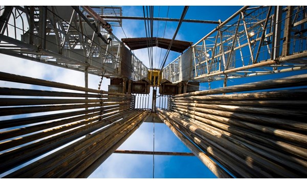 A view of an oil rigs central drilling columns.