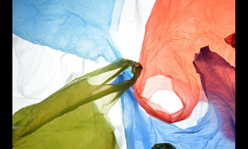 Image shows plastic bags, which have been subject to bans and disincentives in many regions.