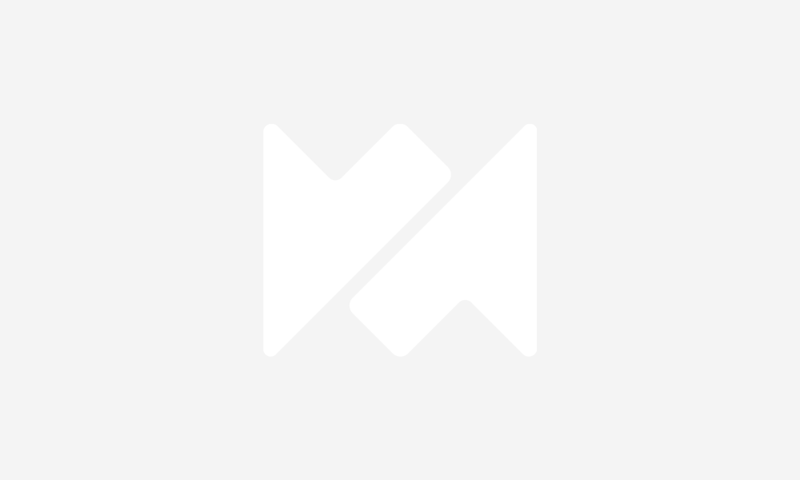 WoodMac symbol on white background.