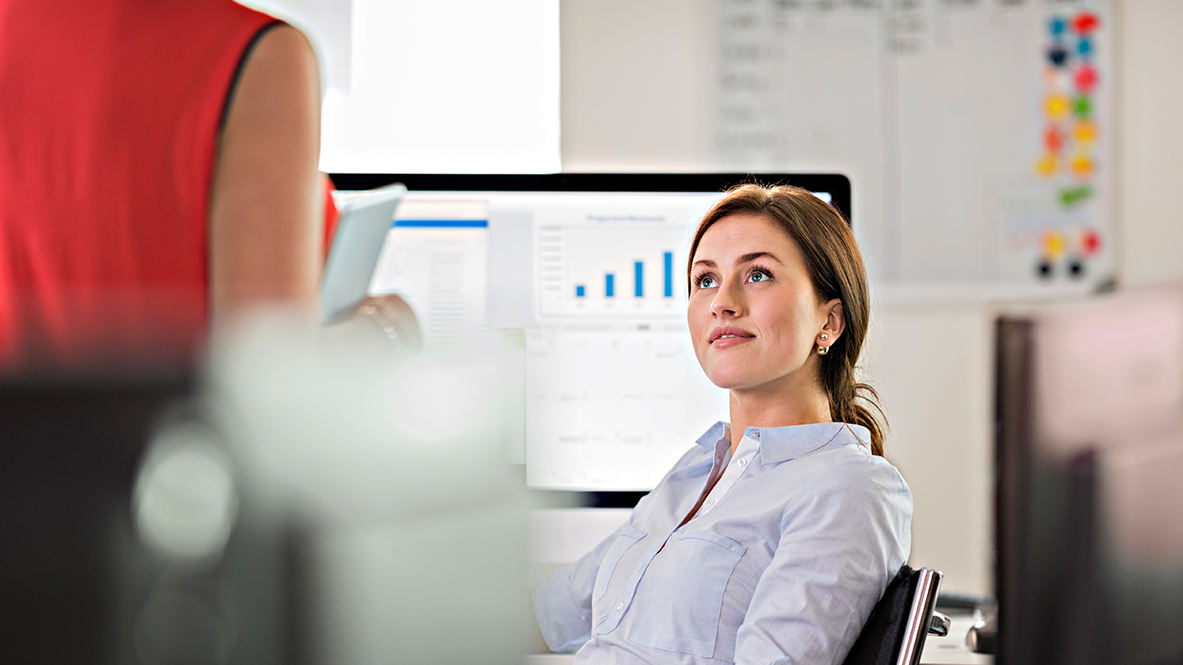Operations team members in conversation.